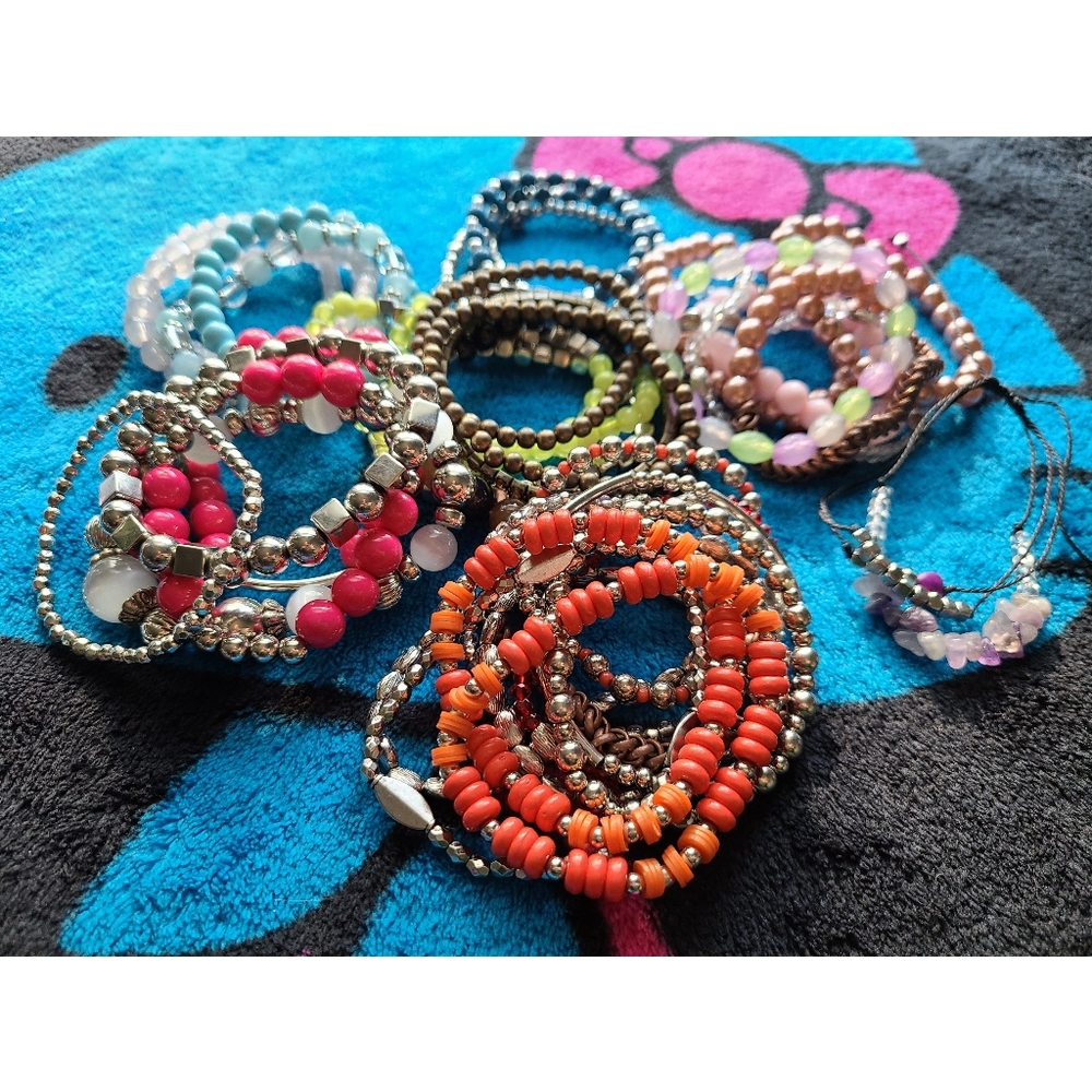 A bunch of Stretchy bracelets and 1 free gift!
